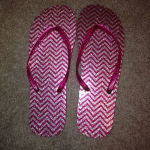 Pink sparkly flip-flops