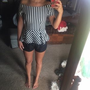 Black and white striped peplum top