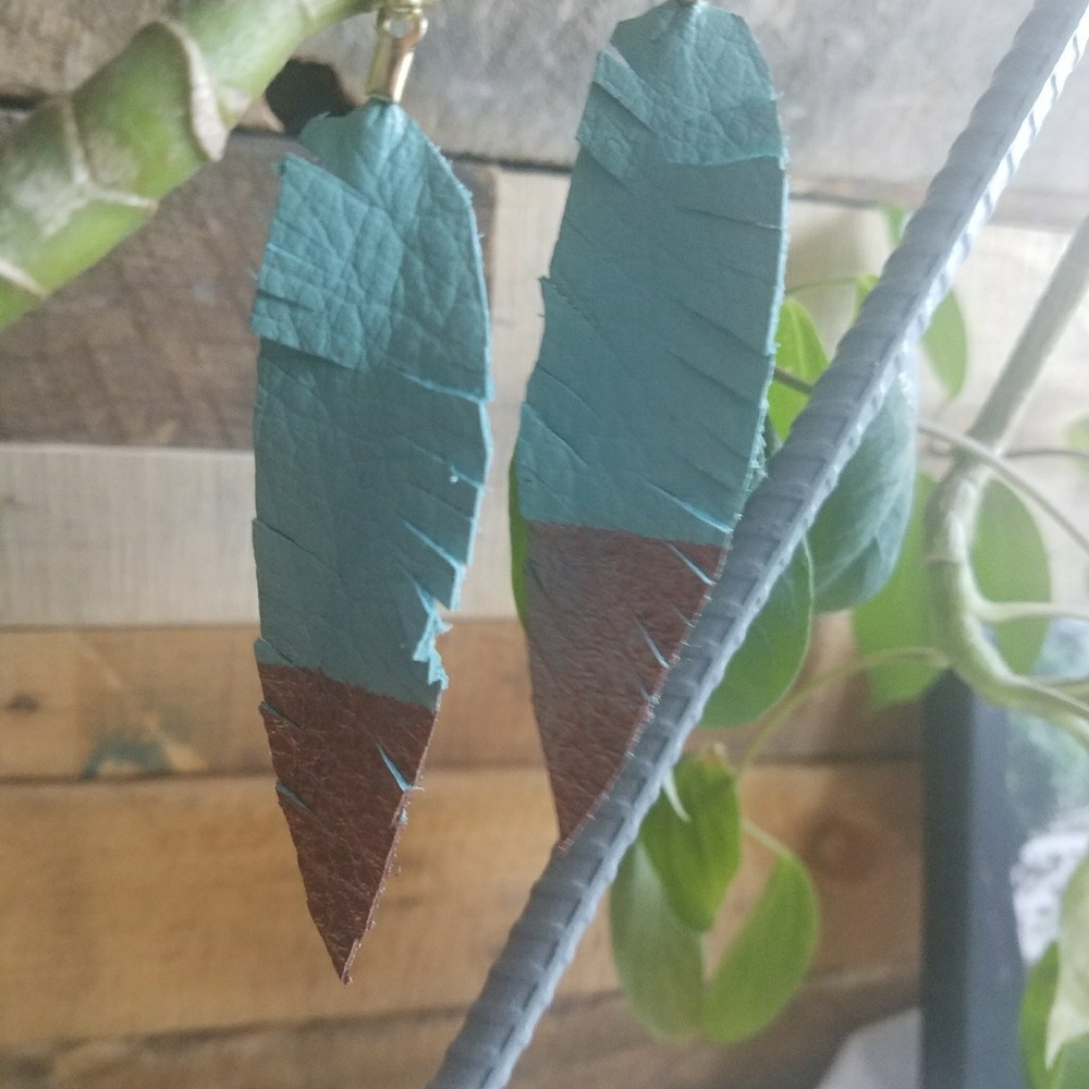 Mint green leather feather earrings