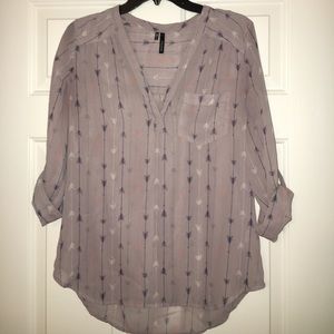 Purple chiffon top with arrows.