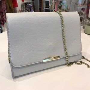 Grey Cross-body bag.