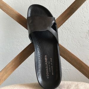Black leather slides