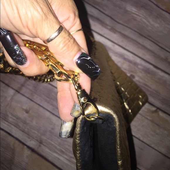 Tory Burch clutch with detach chain like new
