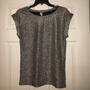Silver metallic cap sleeve dressy t-shirt.