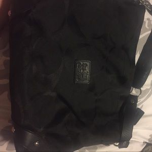 Lovely black single arm coach purse