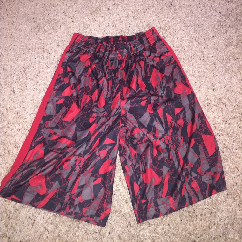 Red and black basketball shorts