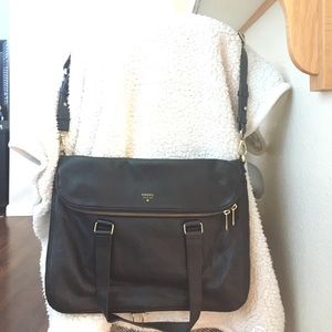 Black soft leather fossil cross body purse.