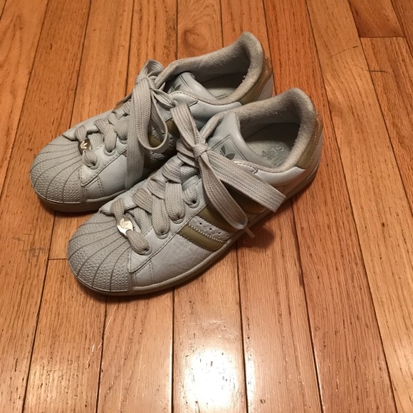 grey and gold superstars