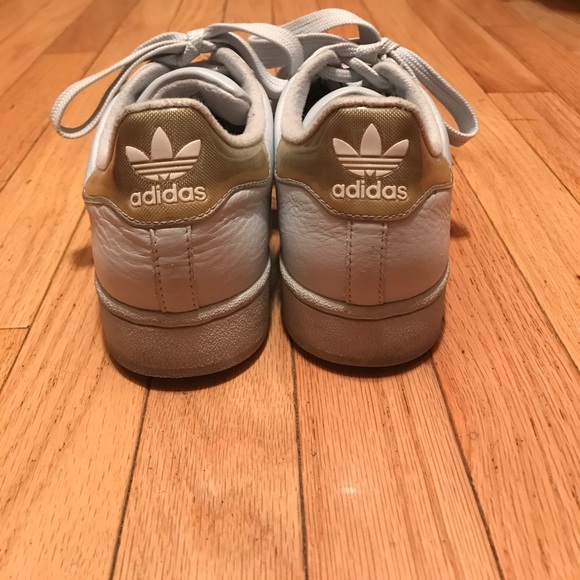 grey and gold superstars