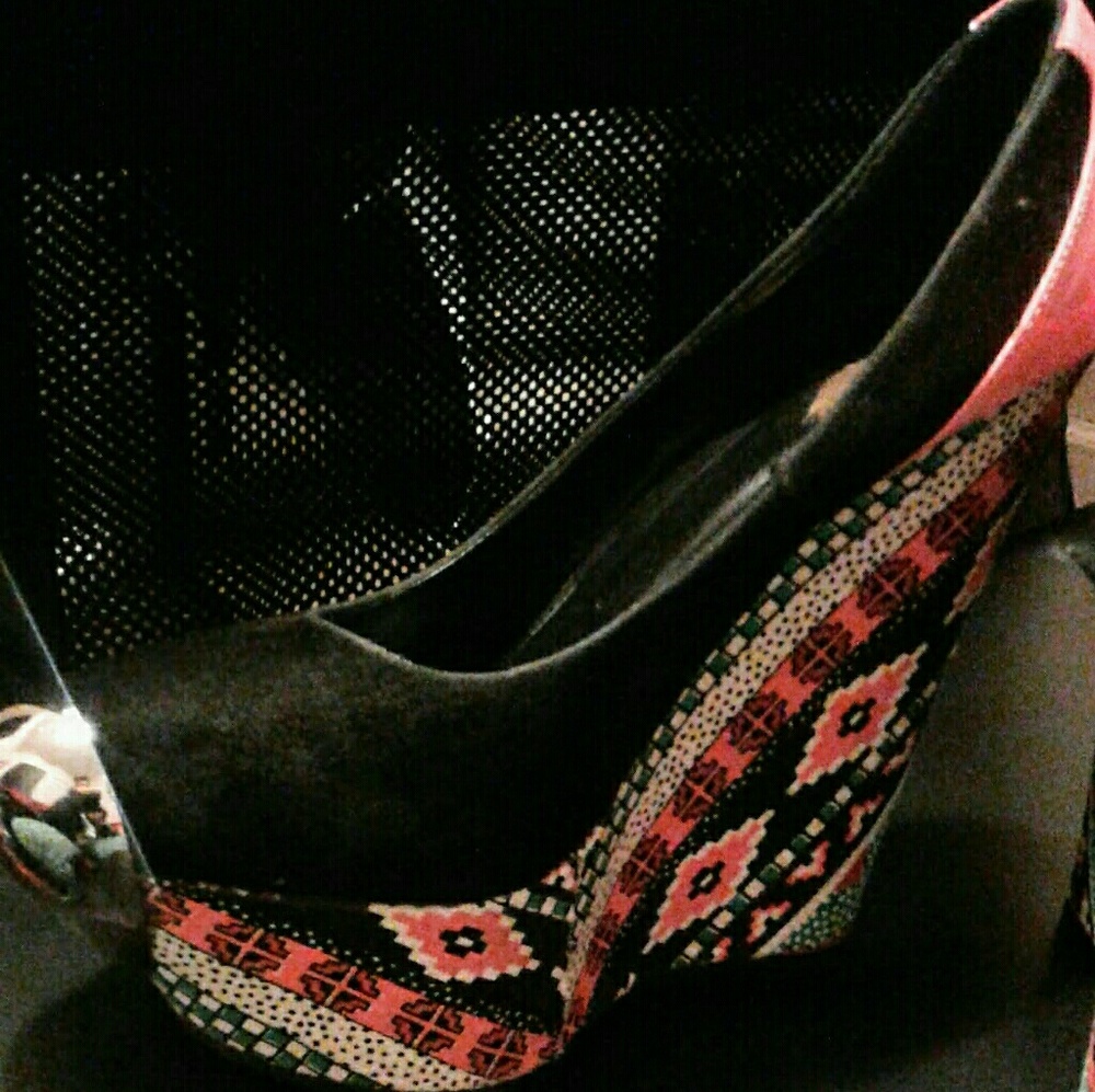 Silver toe multicolored angled wedges.