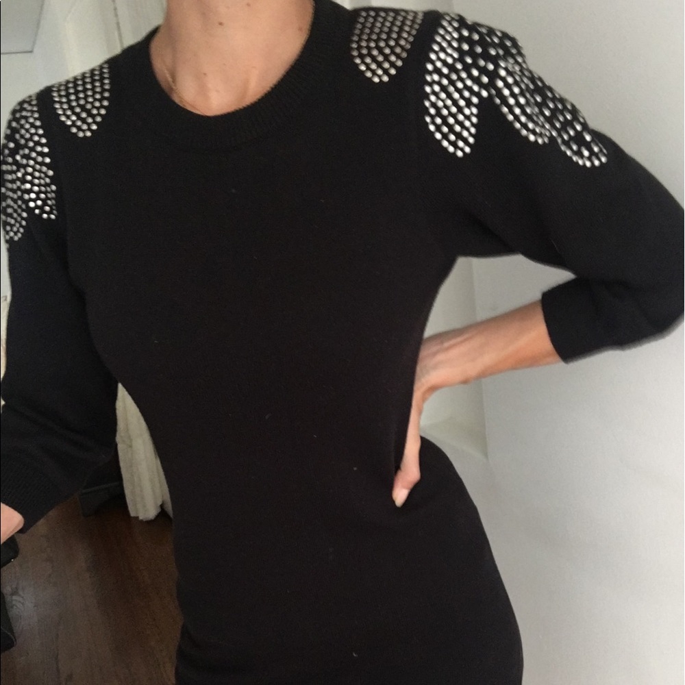 Black knit dress with studded shoulders