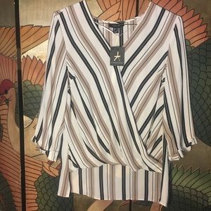 Loose fitting swing top never worn size 12