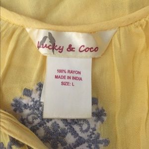 Yellow flowing shirt great with jean or shorts