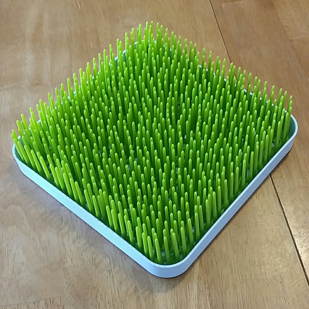 Boon drying grass.