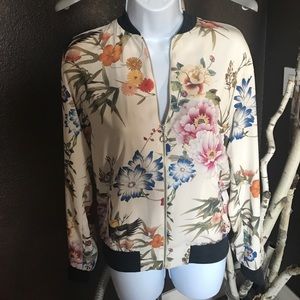Brand new floral printed lightweight jacket.