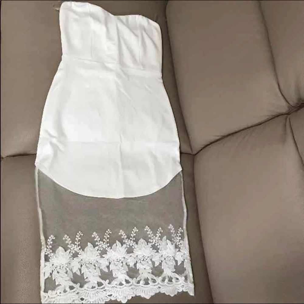 Sexy strapless dress with mesh hem detail