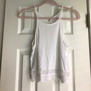 White crop top with crochet bottom detail.