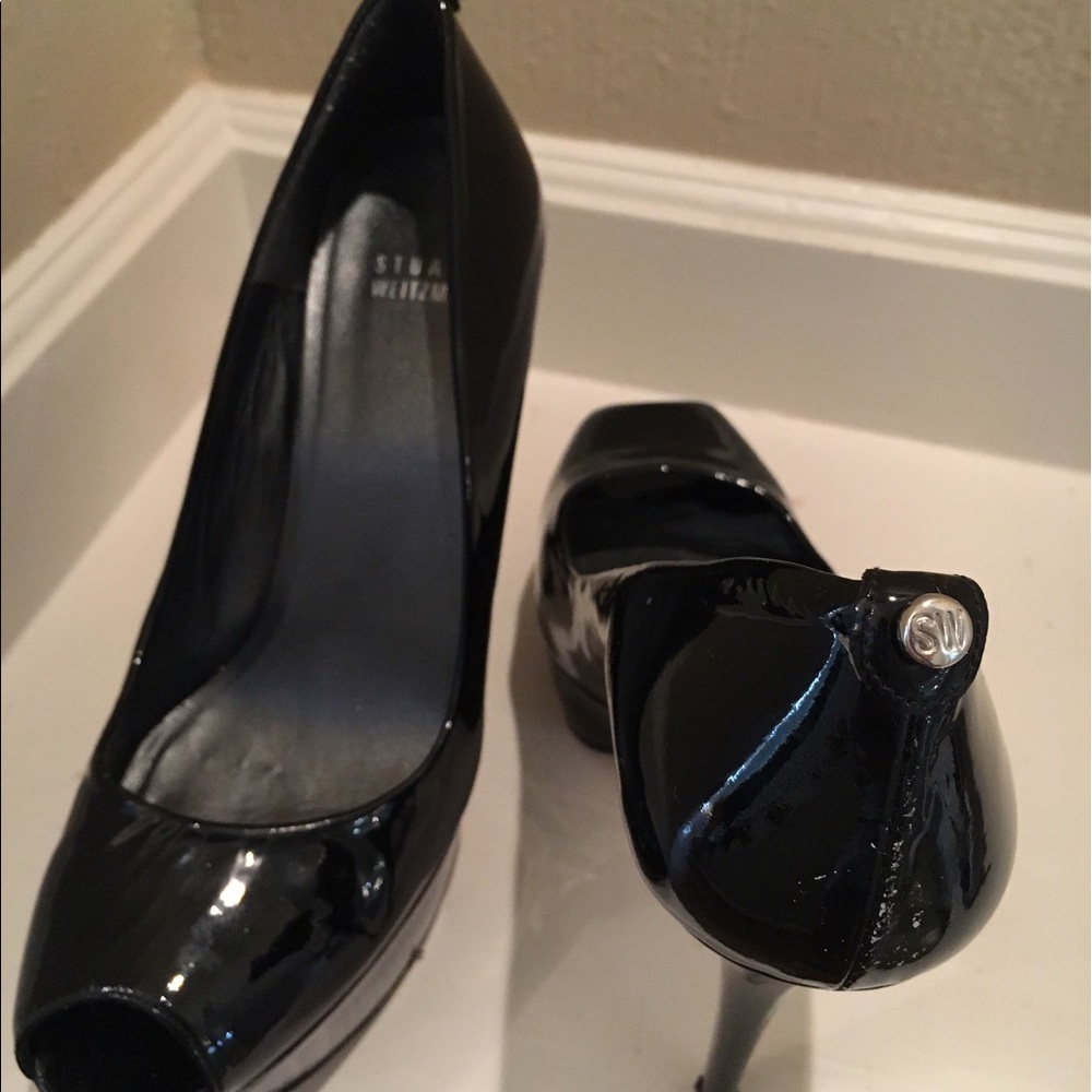 Stuart Weizman platform patent leather pumps.