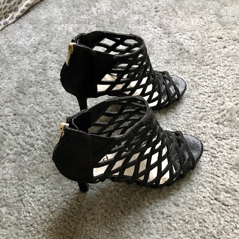 Black high heels worn barely once