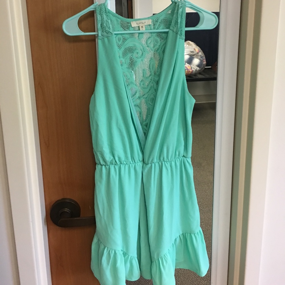 Cute seafoam green romper with lace back