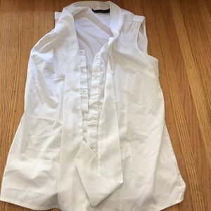 White sleeveless tie blouse