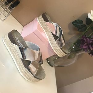 Steve Madden platform sandals.