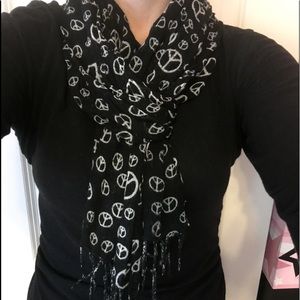 Lightly worn "peace" scarf