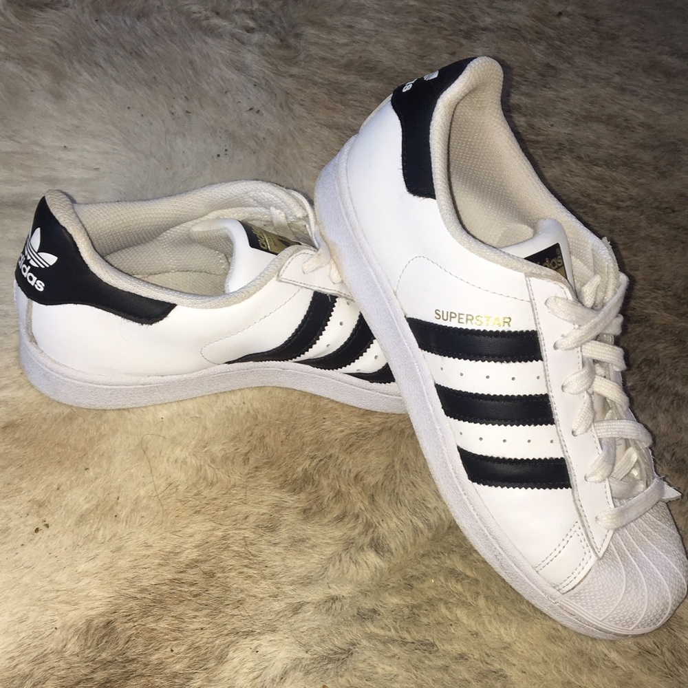 Adidas originals superstars.