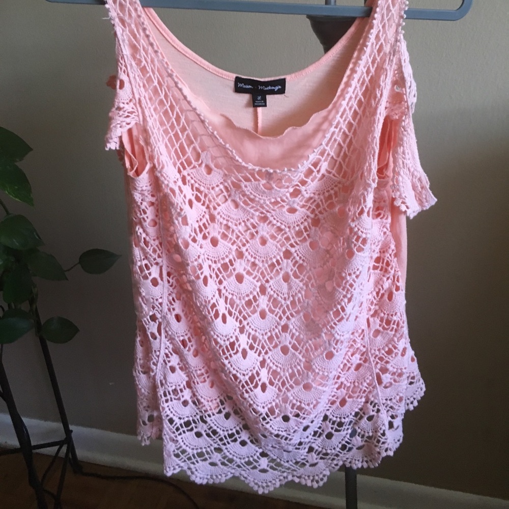 Lace off the cold shoulder/off the shoulder top.