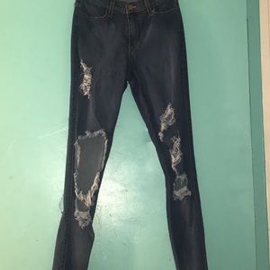 Ripped denim fitted jeans from Fashion Nova