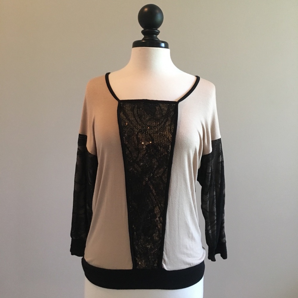 Super cute dolman 3/4 scoop neck from Buckle