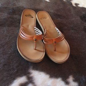 Brown flip flops