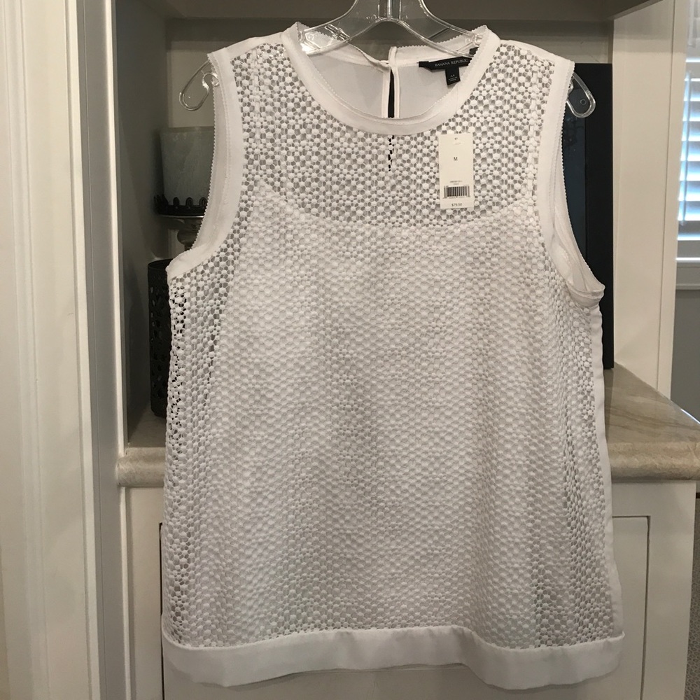 White sleeveless top