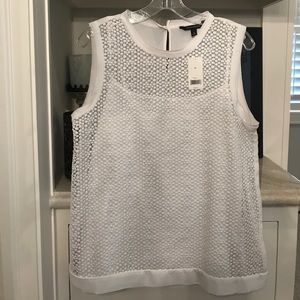 White sleeveless top