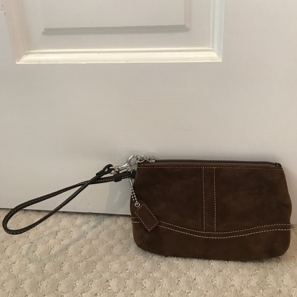 Coach, brown suede wristlet with white stitching