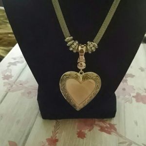 Silver fashion necklace with heart pendant
