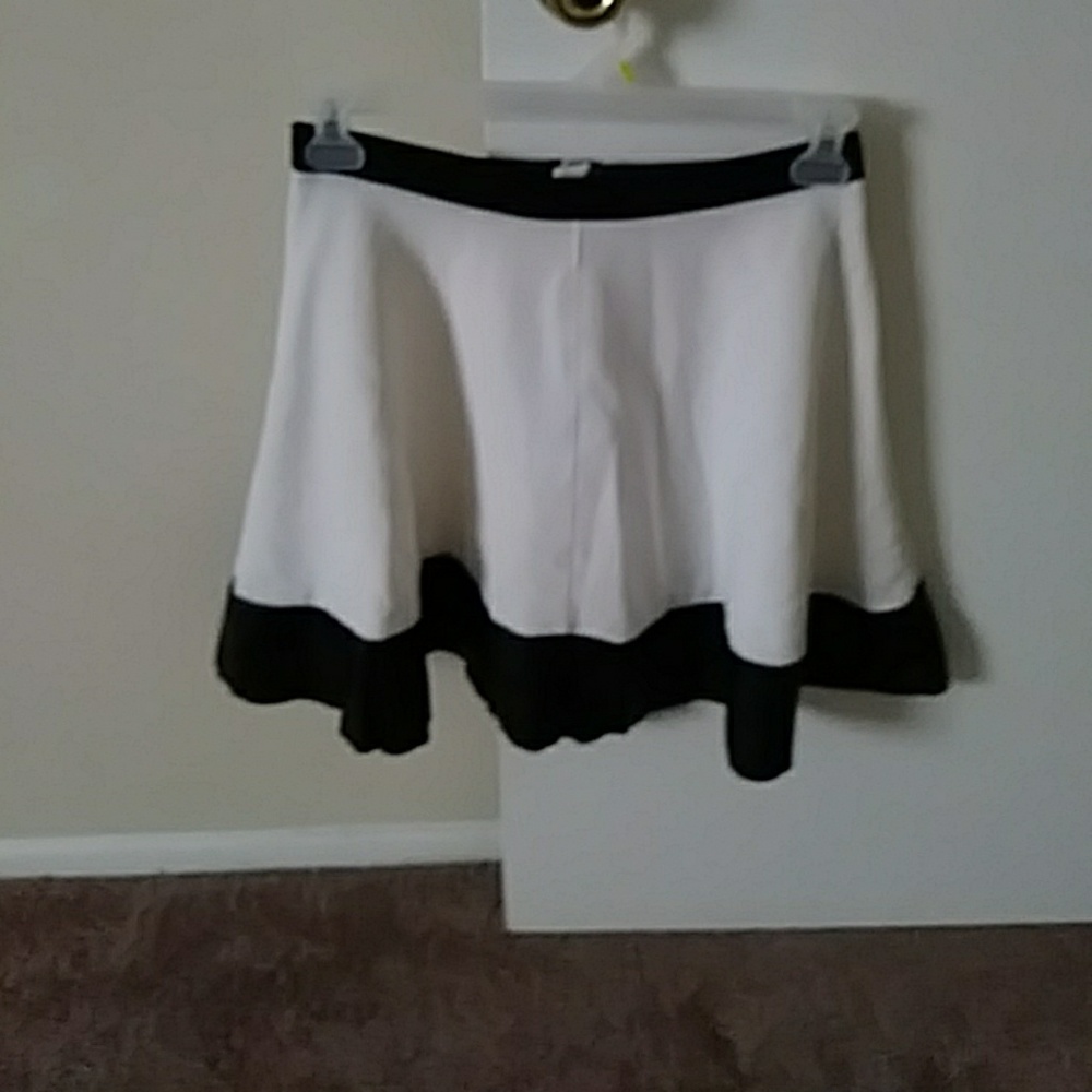 Black leather and white skirt