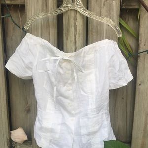 White of shoulder linen top.