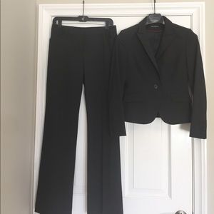 Black pin-stripe suit