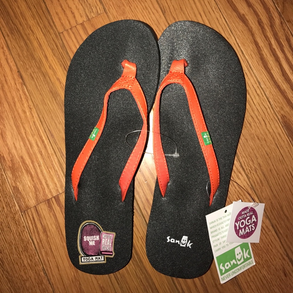 orange Sanuk flip flops