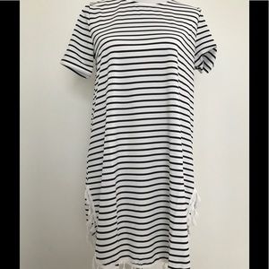 Striped dress with tassels.