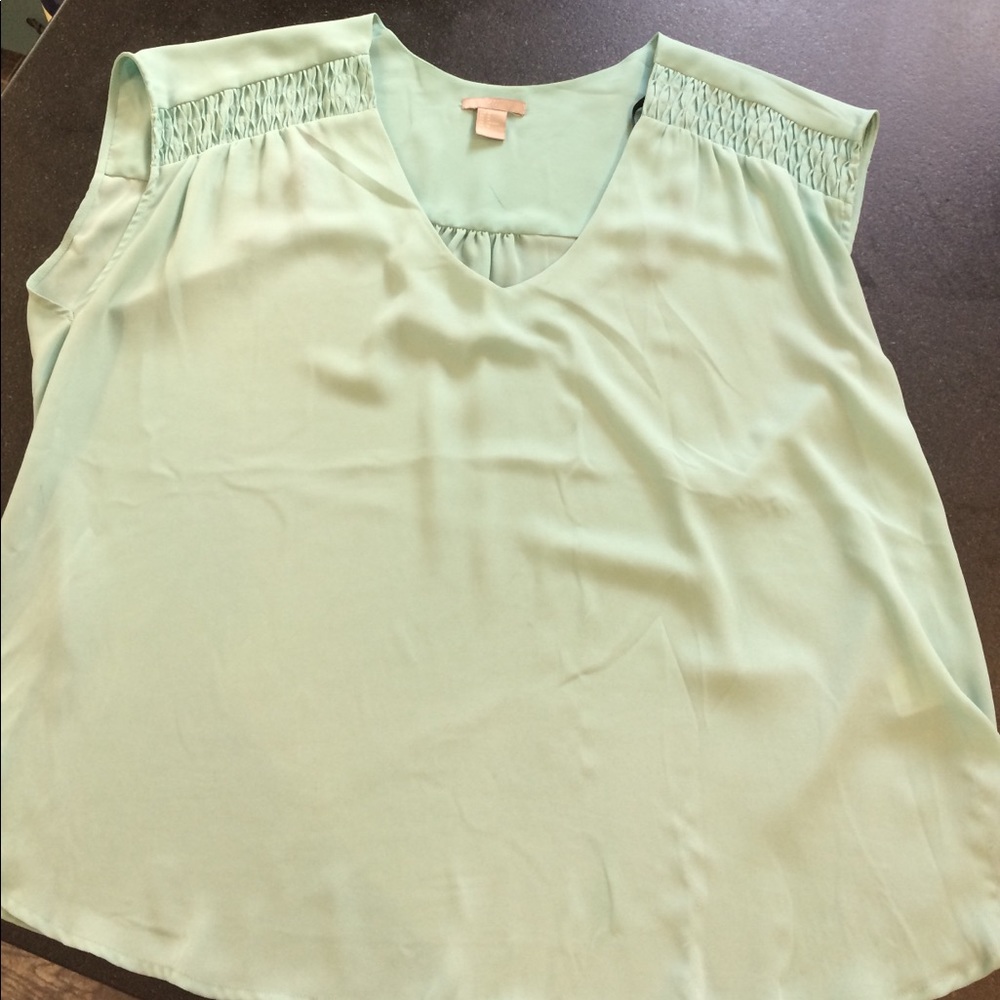 Teal sleeveless blouse