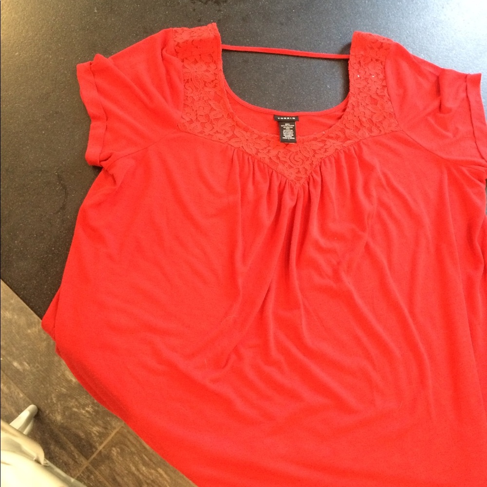 Red blouse with lace details