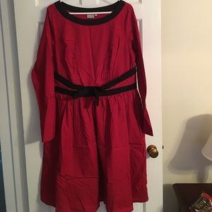 Long sleeved dress with bow at waist