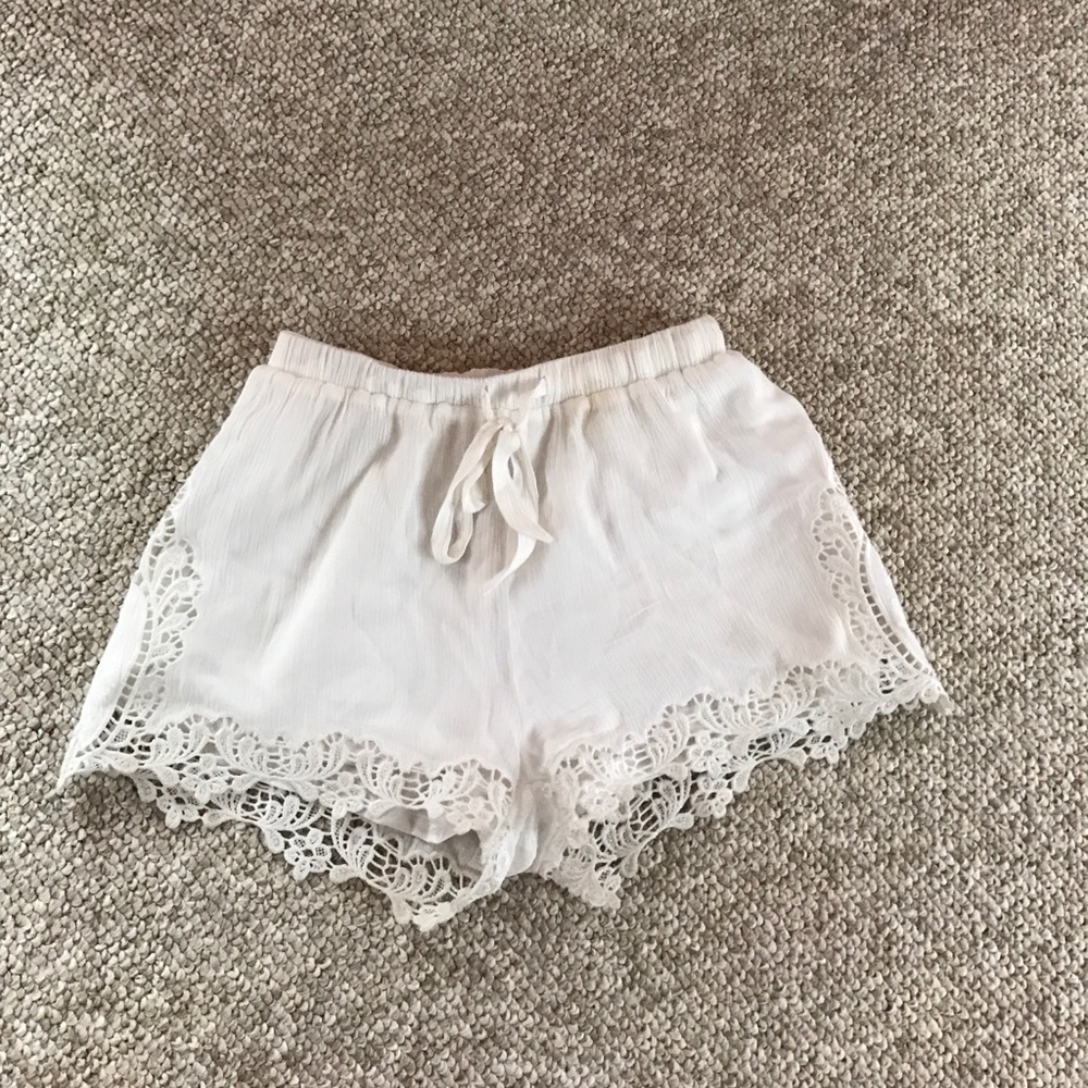 Urban outfitters white flowy shorts lace sides