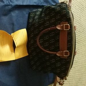 Dooney and Bourke genuine Florentine vacchetta