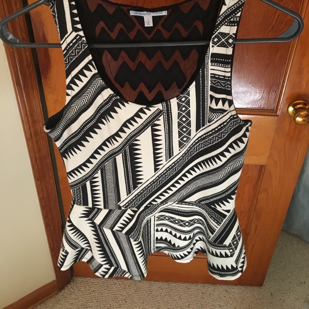 Small black and white peplum top