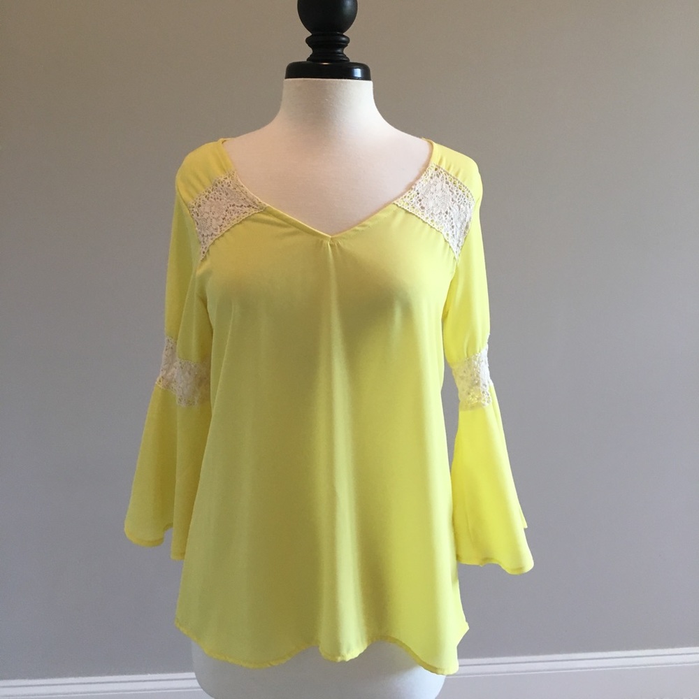 Yellow bell sleeved blouse from Altar'd State