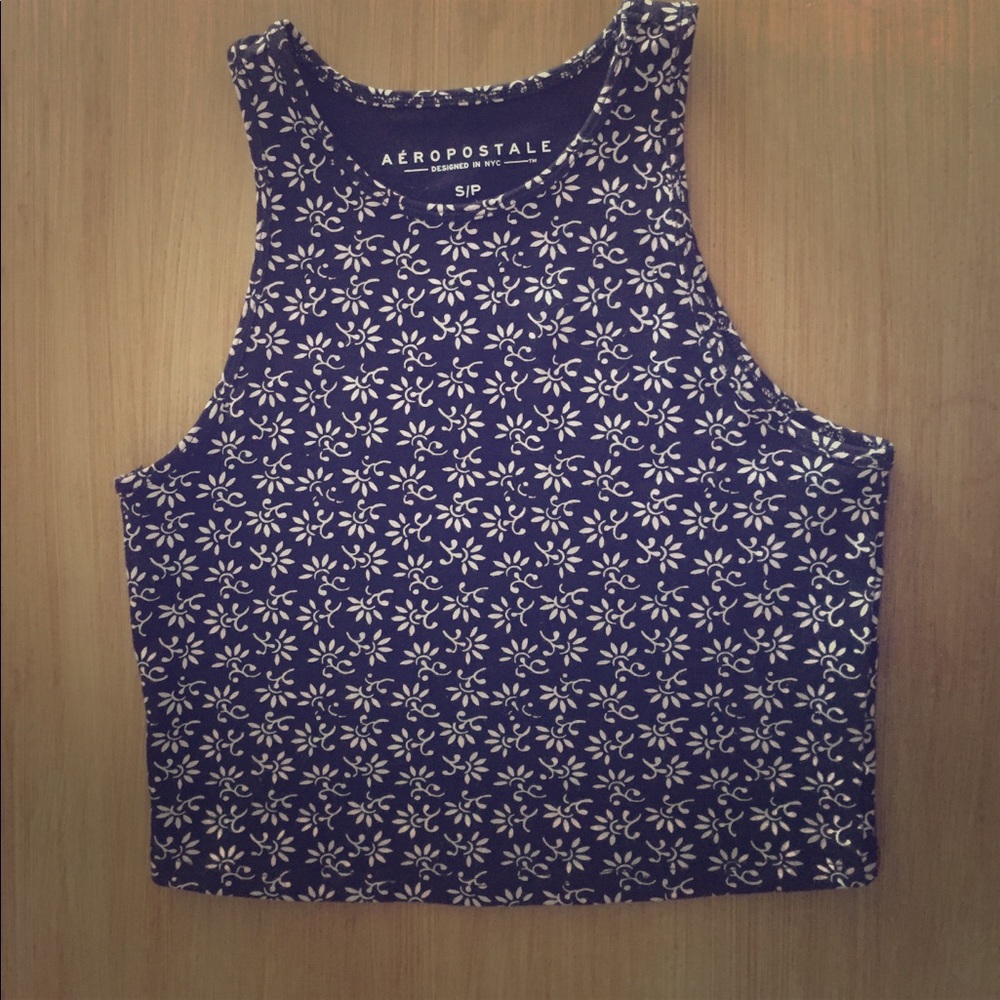 I'm selling a black and white designed crop top.