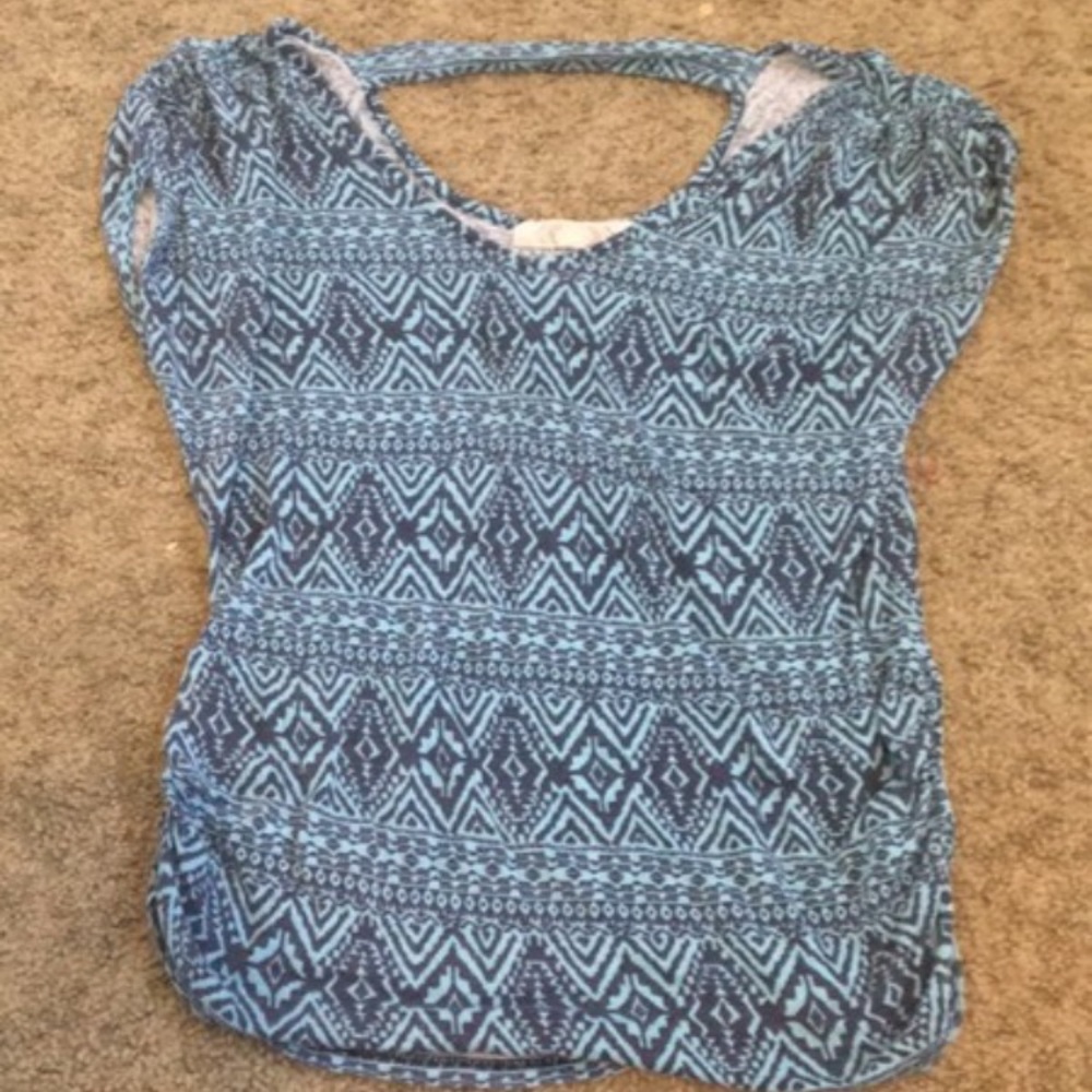 Large tribal shirt open shoulders